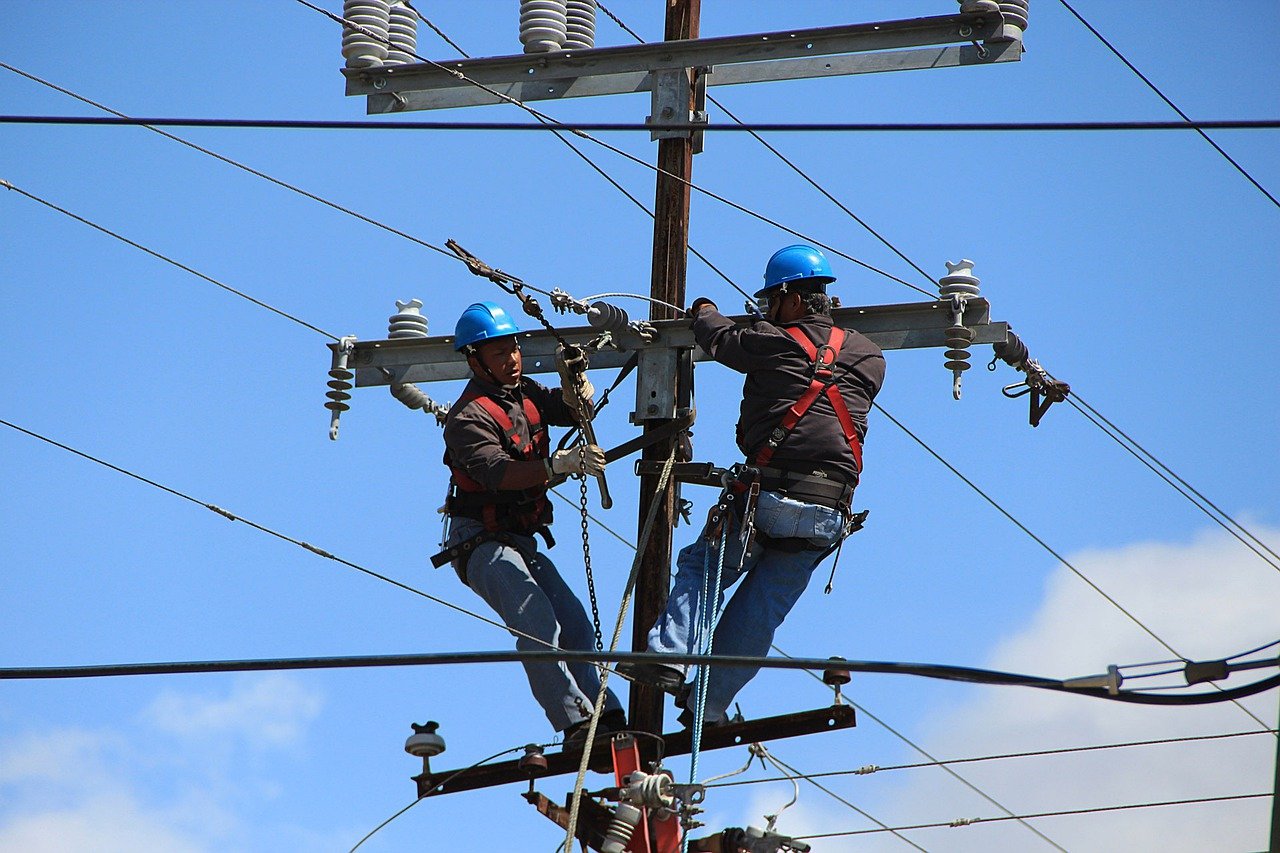 Commercial Electric Contractors completing a Telephone Pole Installation project